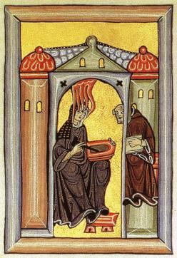 Hildegard receives and dictates a vision. Image from Wikipedia Commons.